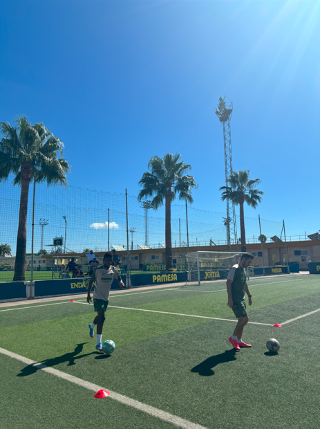 Linamandla Thage receiving football instructions from Villarreal staff